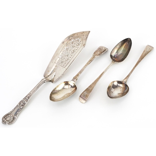 302 - George IV and later silver comprising three Georgian tablespoons and a Victorian fish slice by Willi... 