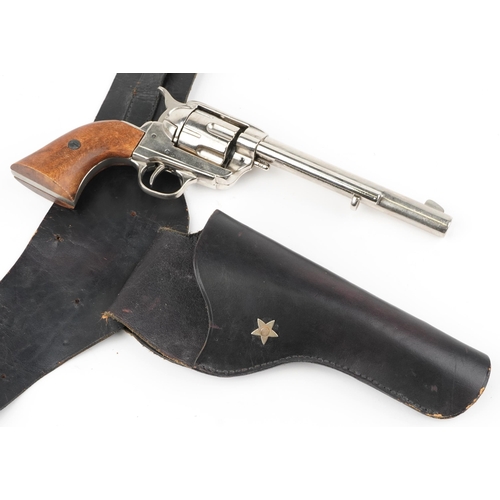 696 - BKA decorative model of a Colt revolver with holster belt, 33cm in length