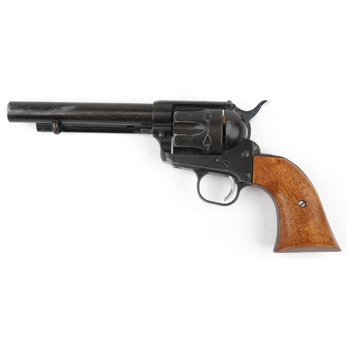 689 - Decorative model of a 1974 single action army 45 revolver, 28cm in length