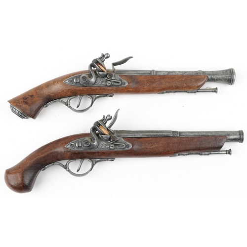 687 - Pair of decorative model percussion pistols, the largest 37cm in length