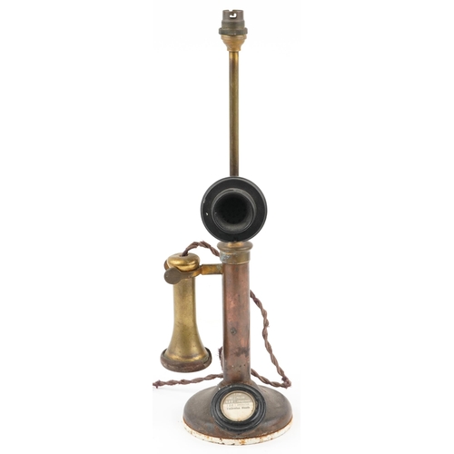 383 - Early 20th century stick telephone table lamp, the phone numbered 150, 49.5cm high