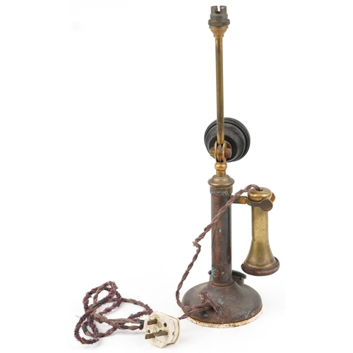 383 - Early 20th century stick telephone table lamp, the phone numbered 150, 49.5cm high