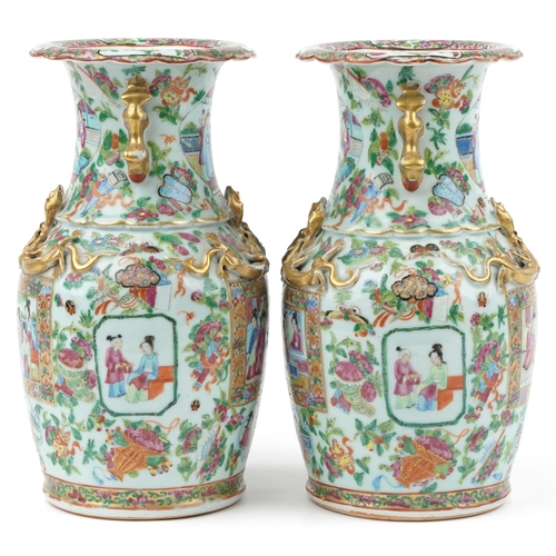  Pair of Chinese Canton porcelain vases with animalia twin handles finely hand painted in the famille... 