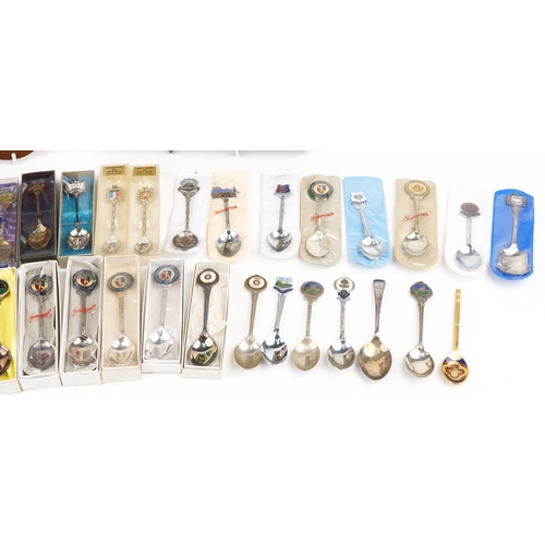 1467 - Sundry items including a vintage bird scarer, souvenir teaspoons and a table lamp in the form of a c... 