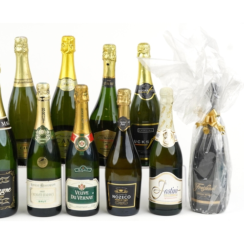 1128 - Twenty bottles of Champagne and sparkling wine including Mumm and Codorniu