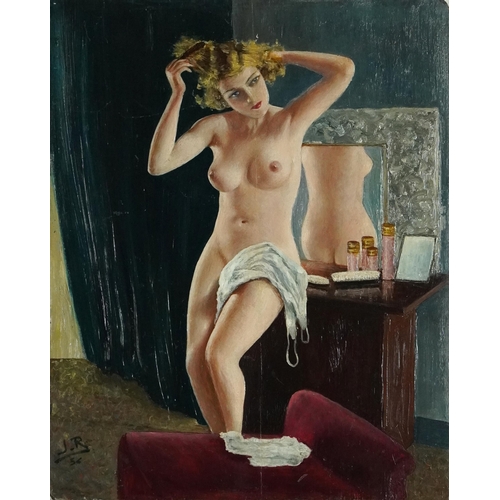 560 - Nude female in a dressing room, 1930s pin-up school oil on wood panel bearing a monogram J R, mounte... 