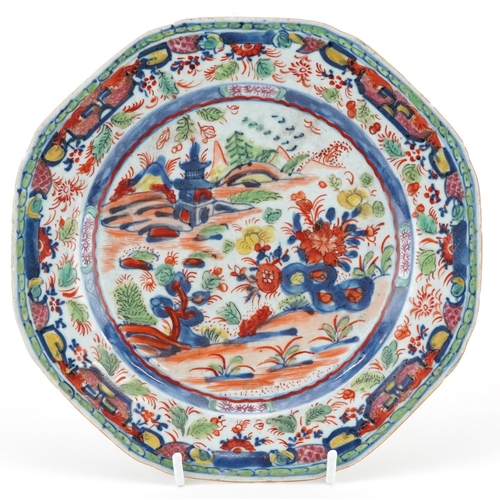 1369 - Chinese porcelain clobbered plate hand painted with a landscape and flowers, 22.5cm in diameter