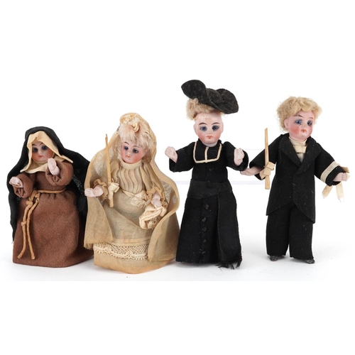 Four 19th century miniature bisque headed dolls with bisque jointed limbs, the largest 12cm high