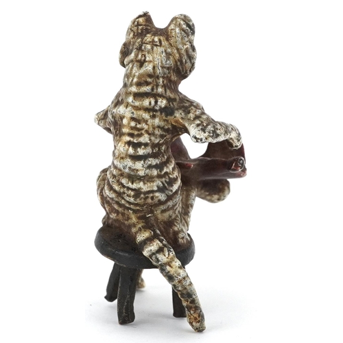 140 - Austrian style cold painted bronze cat seated on a stool, 6cm high