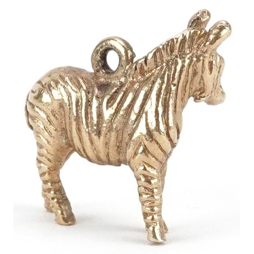 2068 - 9ct gold charm in the form of a zebra, 1.6cm high, 3.0g