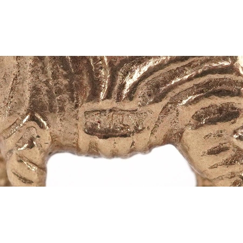 2068 - 9ct gold charm in the form of a zebra, 1.6cm high, 3.0g