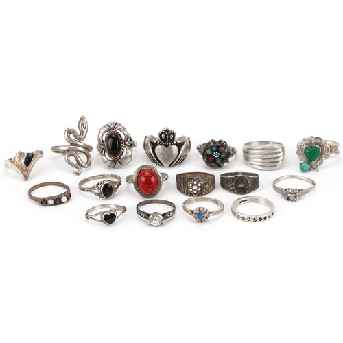 2692 - Seventeen silver rings, some set with semi precious stones including a heavy Claddagh ring and mille... 