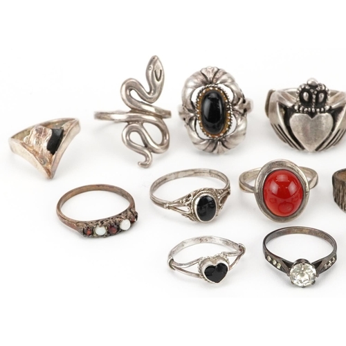 2692 - Seventeen silver rings, some set with semi precious stones including a heavy Claddagh ring and mille... 