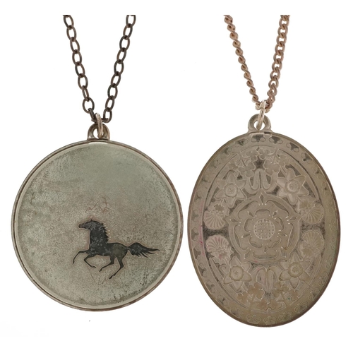 2597 - Two silver medallion pendants on silver necklaces including a 1977 Jubilee Tudor rose, 39.0g