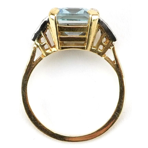 2115 - Art Deco style 9ct gold aquamarine ring with diamond set shoulders housed in a W Bruford box, 
the a... 