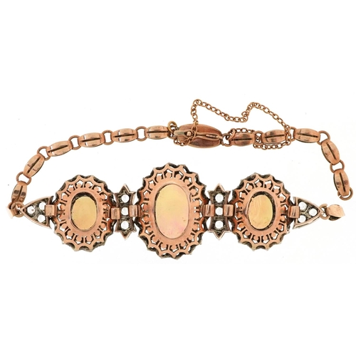 2143 - Victorian style unmarked gold cabochon opal and white sapphire bracelet set with three cabochon opal... 