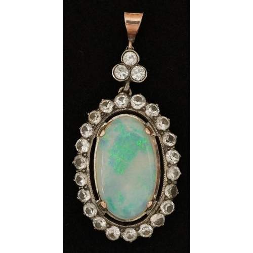 2144 - Victorian style unmarked gold cabochon opal and white sapphire pendant, tests as 9ct gold, the opal ... 