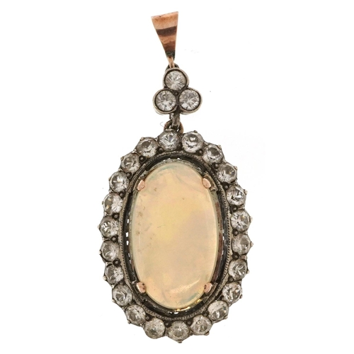 2144 - Victorian style unmarked gold cabochon opal and white sapphire pendant, tests as 9ct gold, the opal ... 