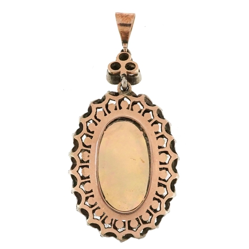 2144 - Victorian style unmarked gold cabochon opal and white sapphire pendant, tests as 9ct gold, the opal ... 