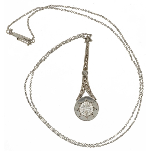 2052 - Unmarked white gold diamond pendant on an unmarked white gold necklace, the largest diamond approxim... 