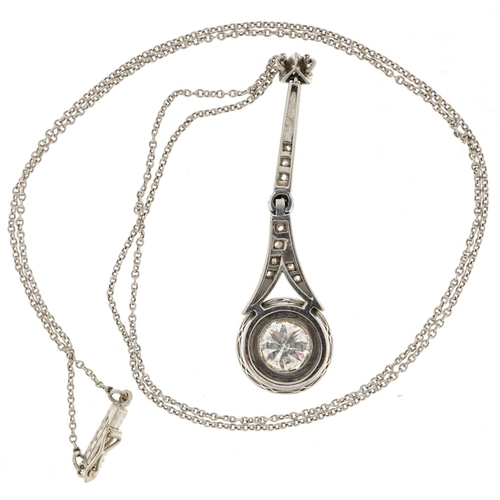 2052 - Unmarked white gold diamond pendant on an unmarked white gold necklace, the largest diamond approxim... 