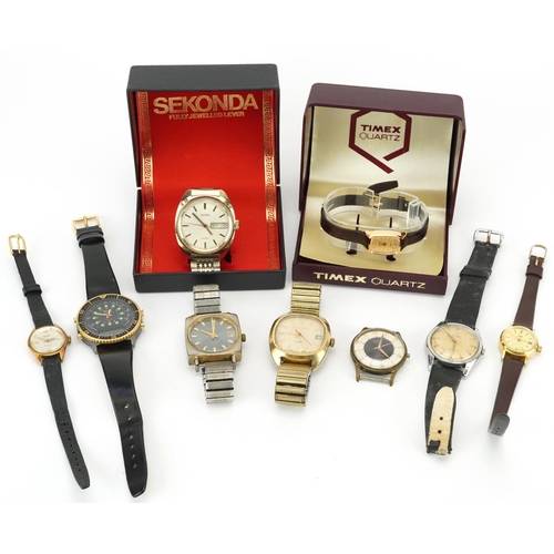 2765 - Nine vintage and later ladies and gentlemen's wristwatches including manual Cyma Navystar, Sekonda a... 