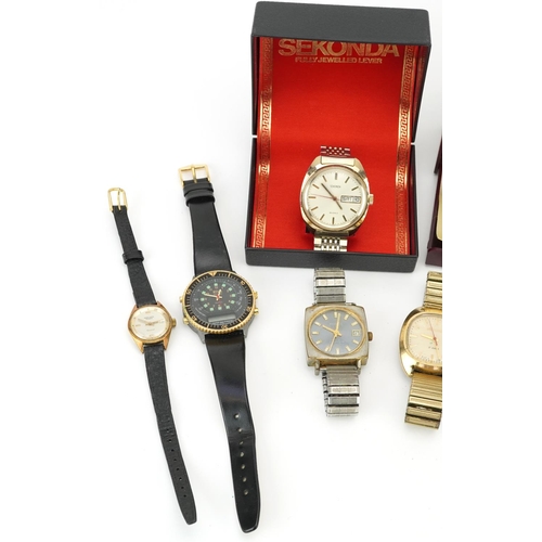 2765 - Nine vintage and later ladies and gentlemen's wristwatches including manual Cyma Navystar, Sekonda a... 