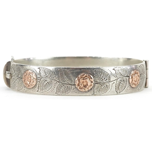 2479 - Joseph Gloster Ltd, silver and gold Tudor rose design hinged bangle, Birmingham 1964, 6.5cm wide, 37... 