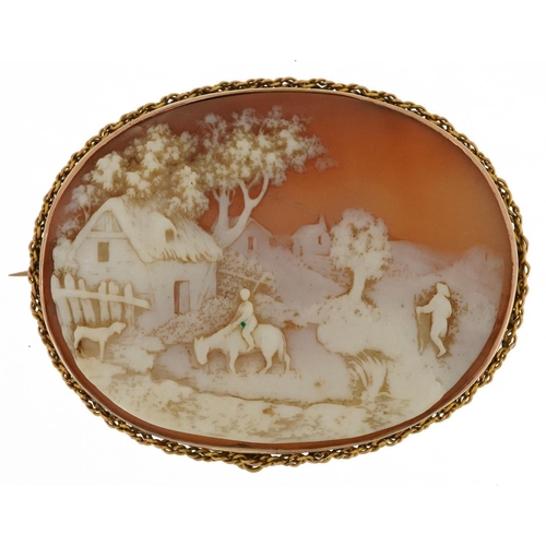 2251 - 19th century unmarked gold cameo shell brooch carved with farmers and cottage before landscape, test... 