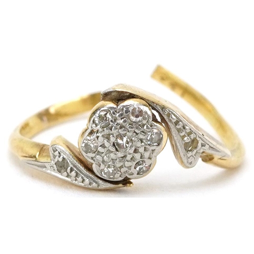 2720 - Broken unmarked gold diamond flower head crossover ring, tests as 18ct gold, 2.2g