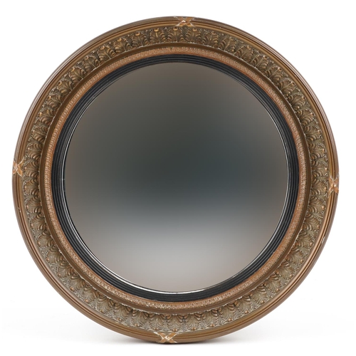 1113 - Gilt framed convex wall mirror with ebonised mount, 41.5cm in diameter