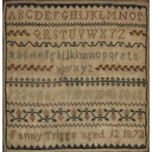 434 - Victorian needlework sampler worked by Fanny Triggs aged 12 1872, mounted, framed and glazed, 15cm x... 