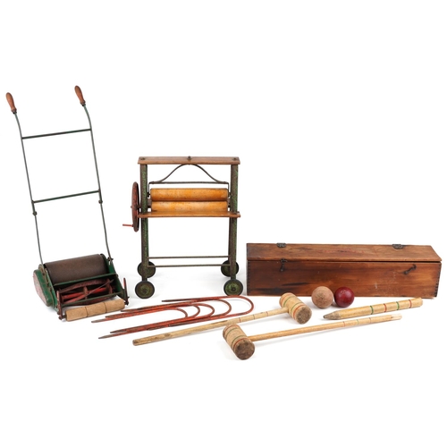 1615 - Vintage toys comprising Tri-ang croquet set with box, Tri-ang mangle and Webb miniature lawnmower fo... 