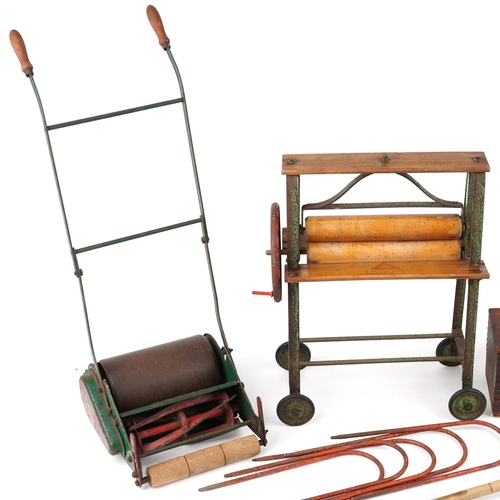 1615 - Vintage toys comprising Tri-ang croquet set with box, Tri-ang mangle and Webb miniature lawnmower fo... 