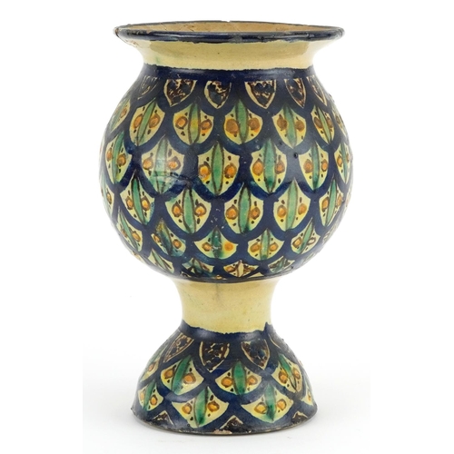 1347 - Islamic pottery vase hand painted with stylised floral motifs, 22cm high