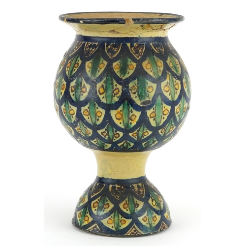 1347 - Islamic pottery vase hand painted with stylised floral motifs, 22cm high