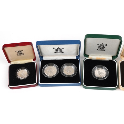 1666 - Silver proof coins with fitted cases by The Royal Mint including ten pence two coin set, 1992 silver... 