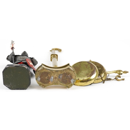 1408 - Pair of Victorian style brass pan scales with dolphins and a Maltese sculpture of a Knight, the larg... 