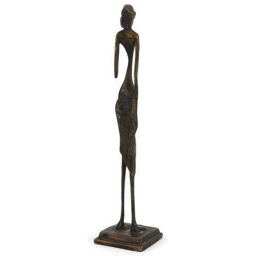 1321 - African patinated bronze figure of a tribesman, 30cm high