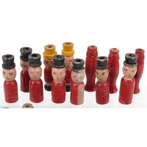 361 - Collection of hand painted carved wood figural whistles, approximately 6.5cm in length