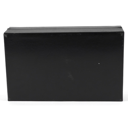 2781 - Black leatherette twelve section watch display box, 8.5cm H x 33cm W x 20cm D