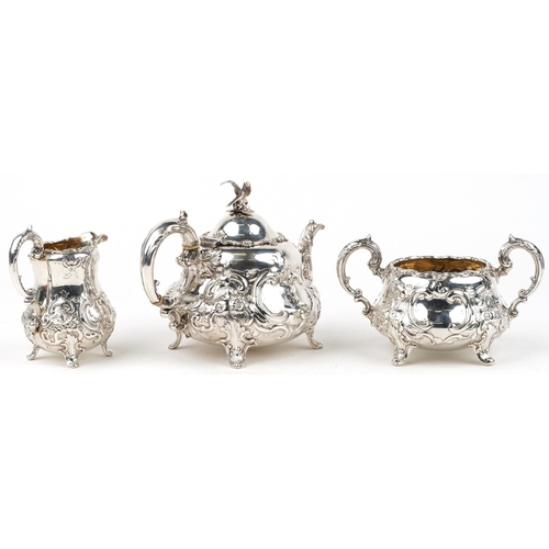 30 - A B Savory & Sons, Victorian silver Rococo style three piece tea service profusely embossed with aca... 