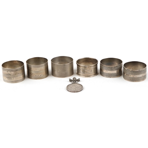 300 - Six George V and later silver napkin rings including two pairs and a 1967 United States of America h... 