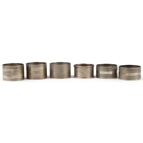 300 - Six George V and later silver napkin rings including two pairs and a 1967 United States of America h... 