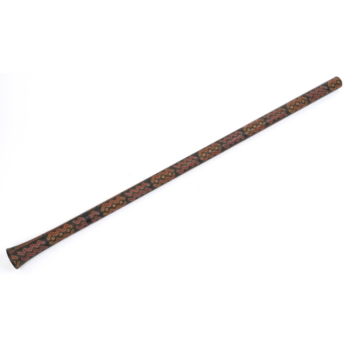 1216 - Aboriginal interest didgeridoo having allover geometric motifs, 146cm in length