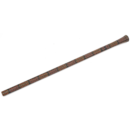 1216 - Aboriginal interest didgeridoo having allover geometric motifs, 146cm in length