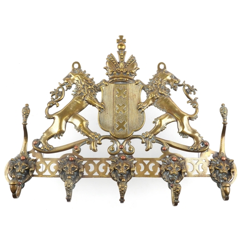 189 - 19th century brass coat of arms five section coat rack, 44cm wide