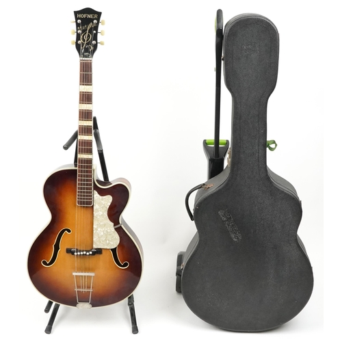 1196 - Hofner six string acoustic guitar with green baize lined protective case, 104cm in length