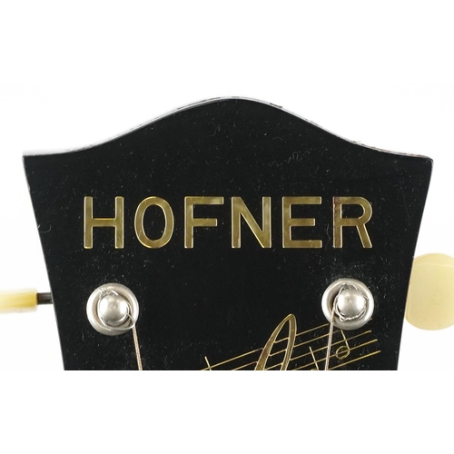 1196 - Hofner six string acoustic guitar with green baize lined protective case, 104cm in length