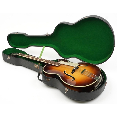 1196 - Hofner six string acoustic guitar with green baize lined protective case, 104cm in length